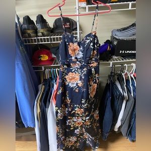 Lulu’s “My Favorite Day Navy Blue Floral Print Tulip Skirt Midi Dress”